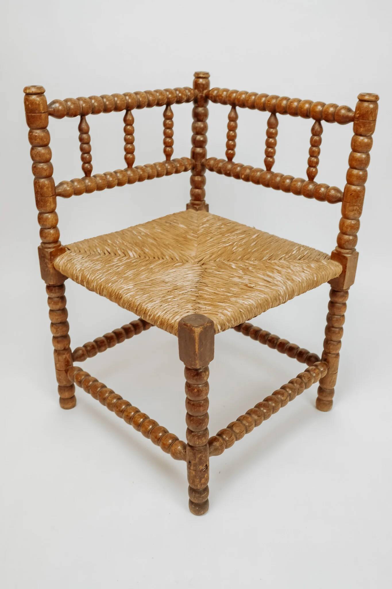 Classic vintage bobbin corner armchair