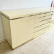 Buffet Jean-Claude Mahey in beige lacquer and brass – circa 1970