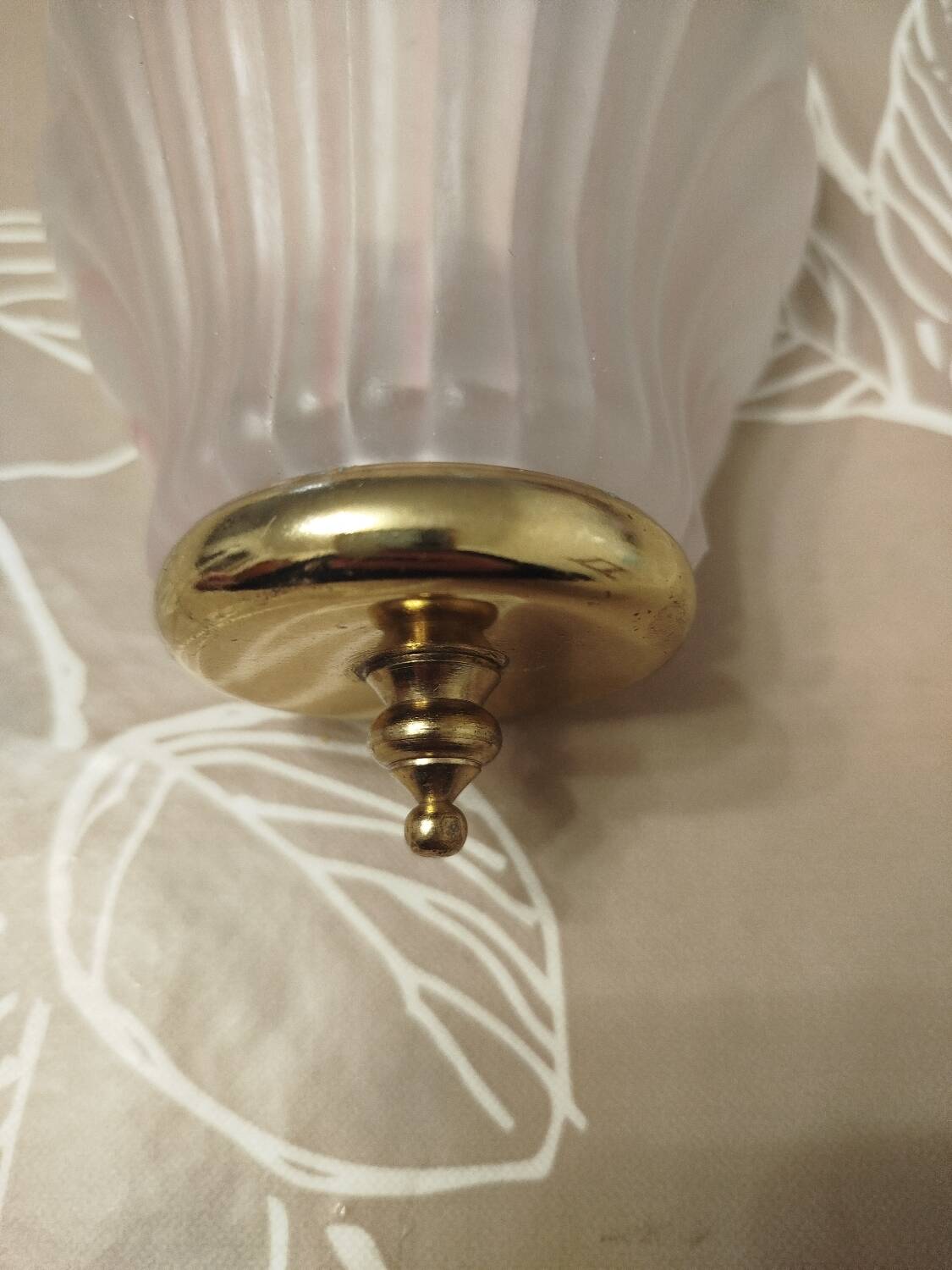 Art Deco wall sconce in frosted pink glass with a seashell design
