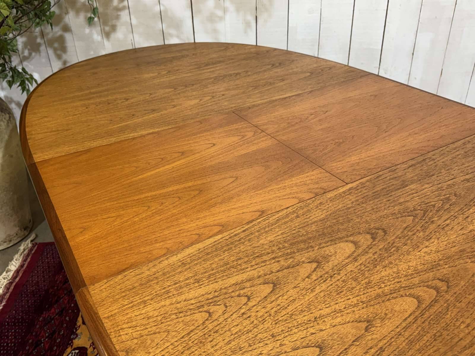 G-Plan oval teak table from the 1970s with a butterfly extension.
