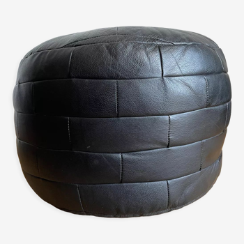 Black patchwork leather pouf from Sède