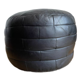Black patchwork leather pouf from Sède