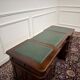 Classic English desk with green leather inlay.