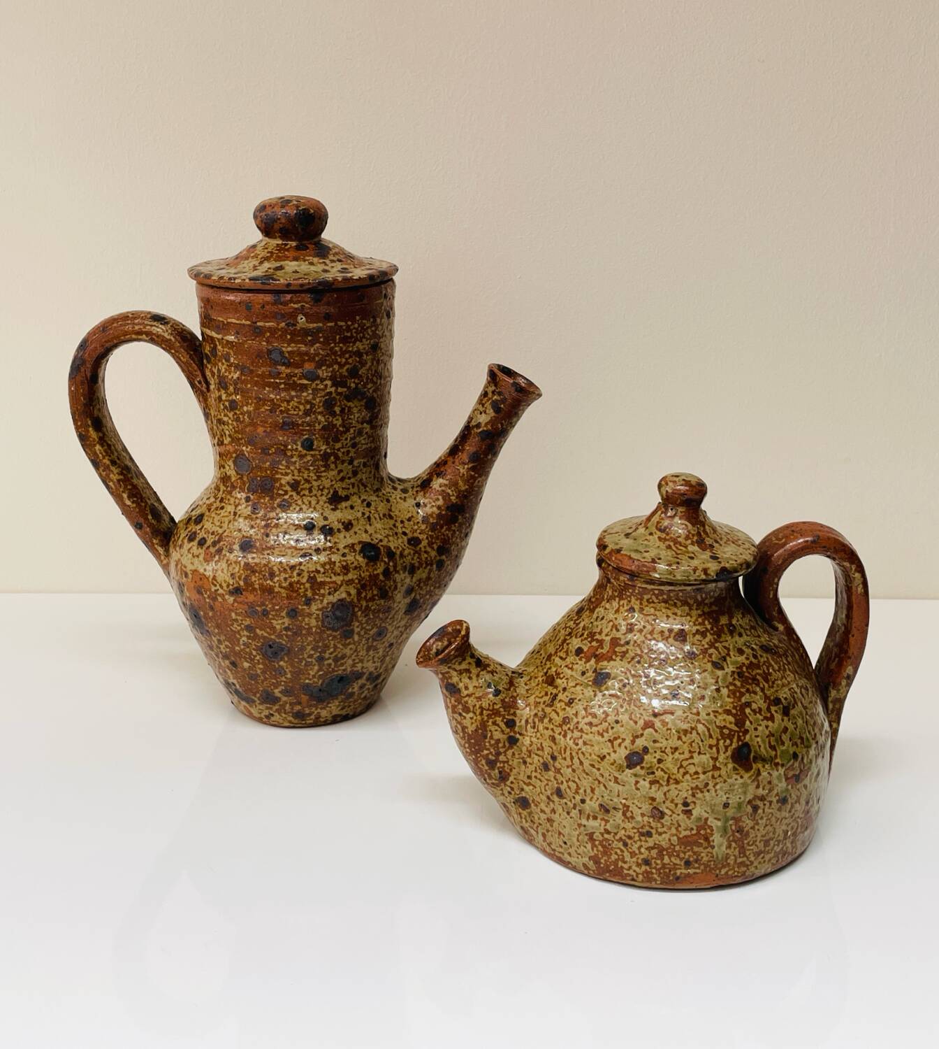 Pair of vintage brutalist ceramic teapots from the 1970s.