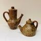 Pair of vintage brutalist ceramic teapots from the 1970s.
