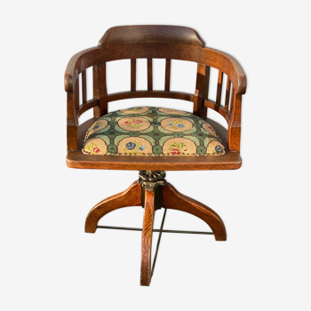 Antique oak swivel captains chair