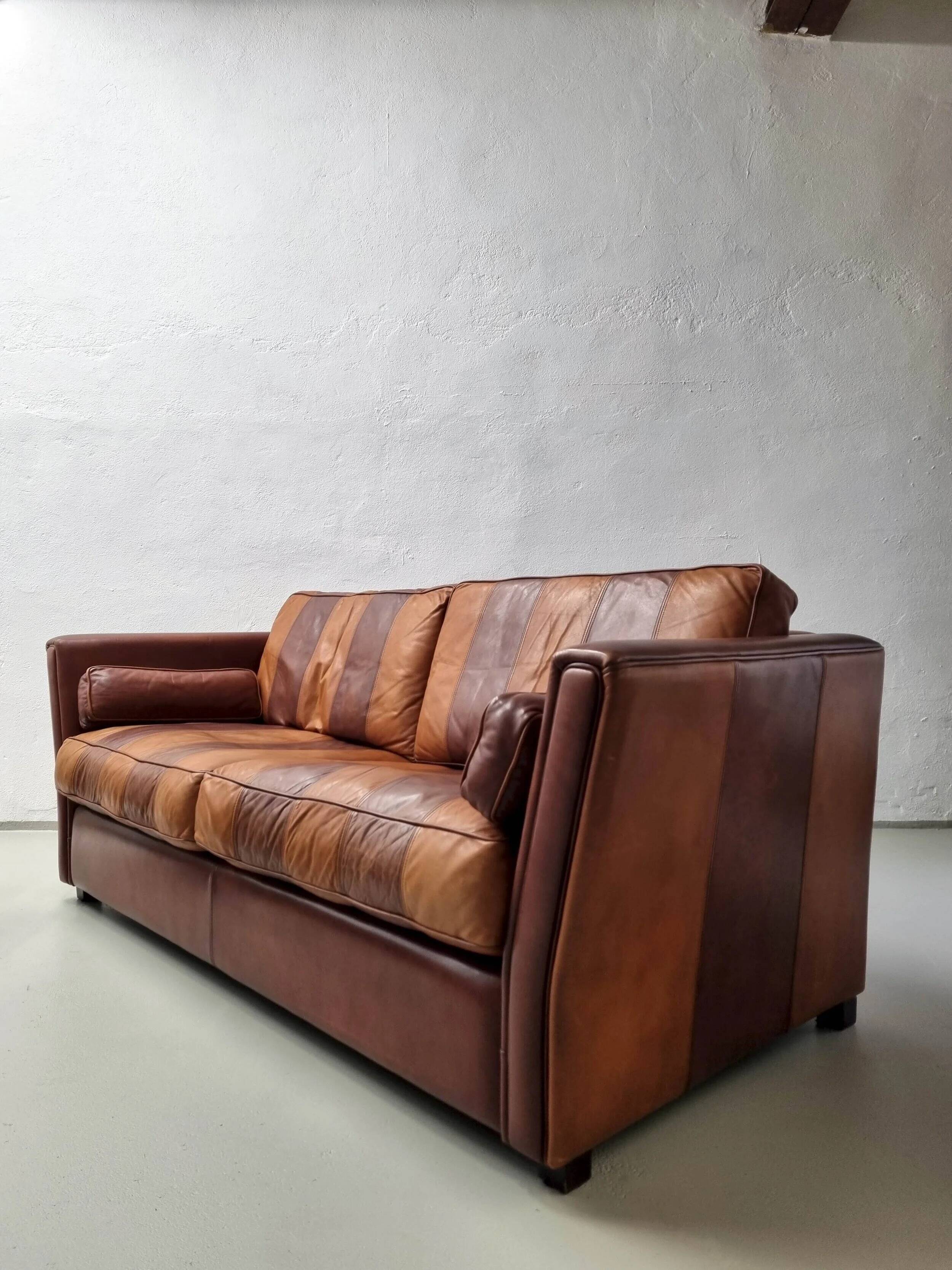 Vintage striped brown orange leather sofa (210 cm x 88 cm)