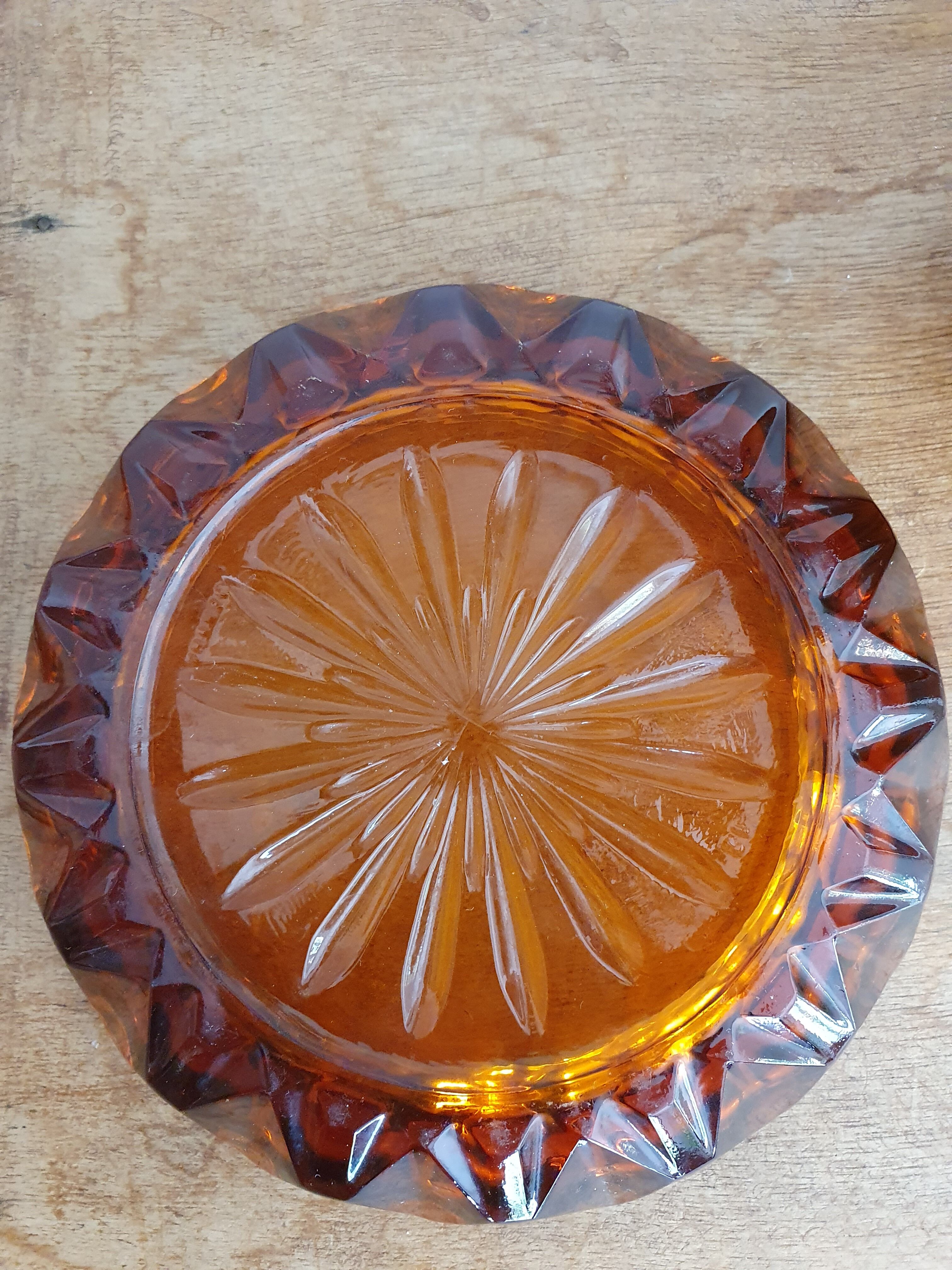 Amber glass ashtray