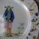 Malicorne earthenware plates, late nineteenth century, Breton décor.
