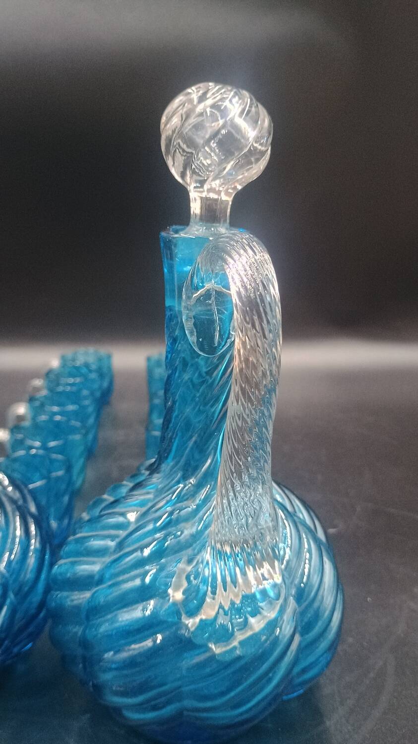 Cabaret Portieux liqueur service with 10 blue and clear glasses.