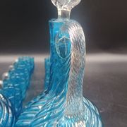 Cabaret Portieux liqueur service with 10 blue and clear glasses.