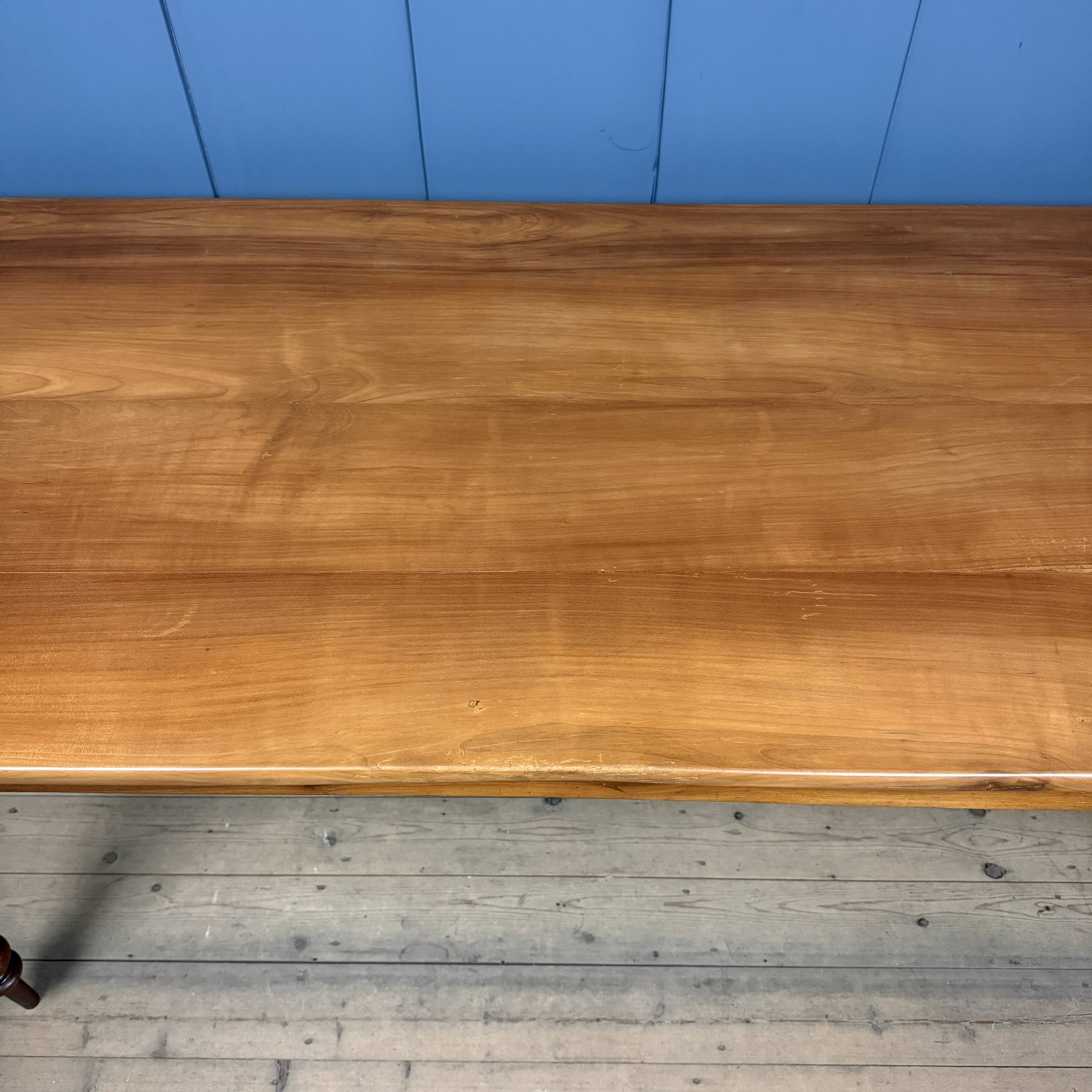 Antique cherry wood dining table from France.