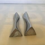 Pair of small silver triangular candlesticks