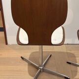 Lot of 4 vintage swivel chairs in the style of Arne Jacobsen.