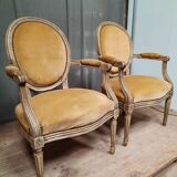 Pair of Louis XVI style medallion armchairs
