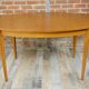 Wooden oval table and 6 matching chairs 60
