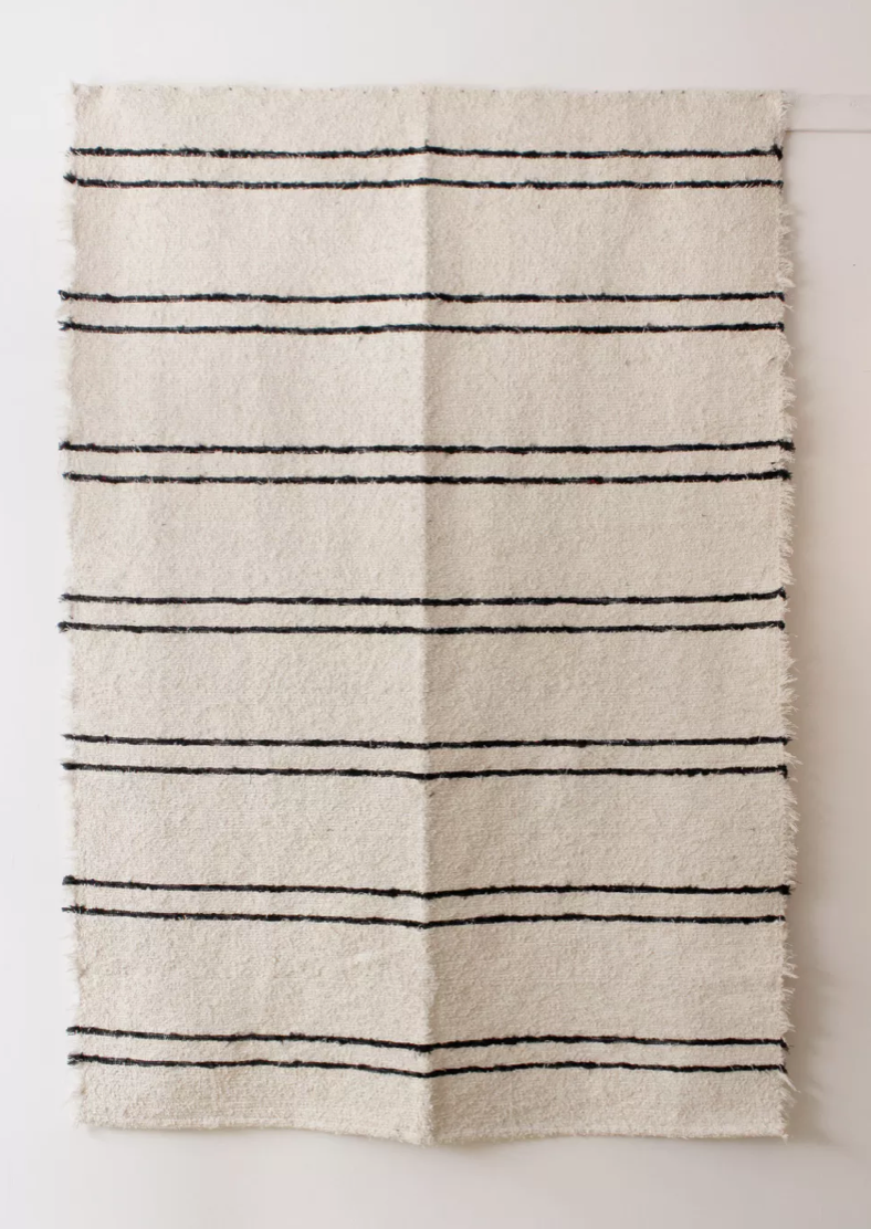 White carpets black Berber lines