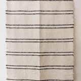 White carpets black Berber lines