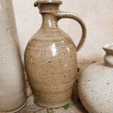 Stoneware decanters and candle holder