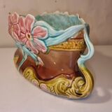 Old barbotine planter with flower patterns