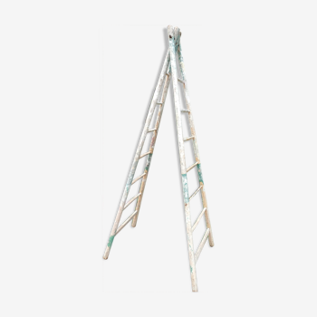 Old double wooden painter's ladder