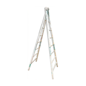 Old double wooden painter's ladder