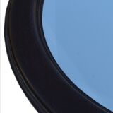 Round mirror in solid oak, bevelled, damaged, diameter 56cm.