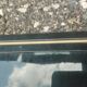 Vintage metal coffee table with glass top.