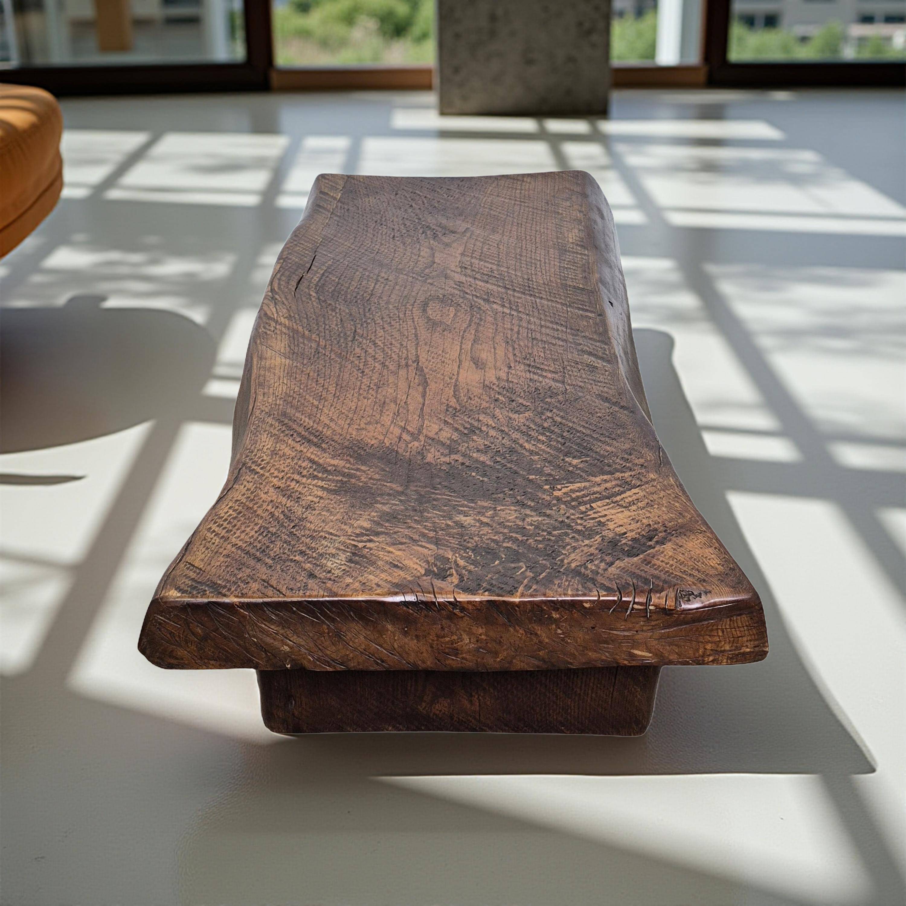 Rustic solid oak coffee table with a one piece top, France 1950s
