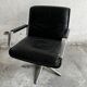 Wilkhahn Delta lounge chair in black leather with polished aluminum base and footrest (1970s)