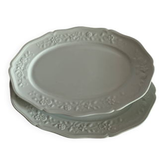 pair of white flowered dishes