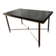 Black marble coffee table with brass legs.
