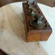 Box with old brass weight
