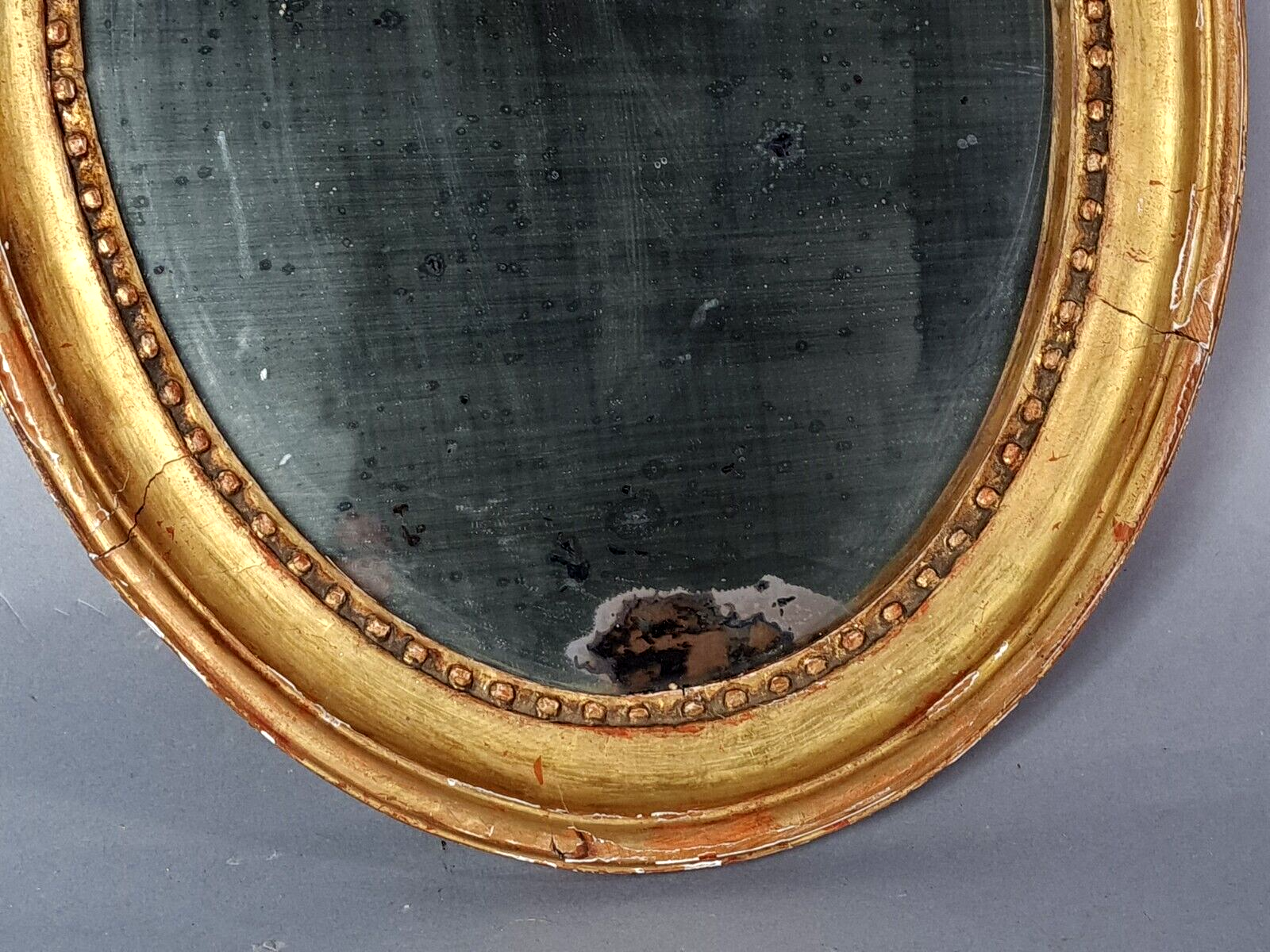 Oval mirror carved wood frame beaded gilded circa 1800 44x35cm SB