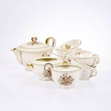 Porcelain tea service by Théodore Haviland, gilded patterns.