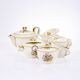 Porcelain tea service by Théodore Haviland, gilded patterns.
