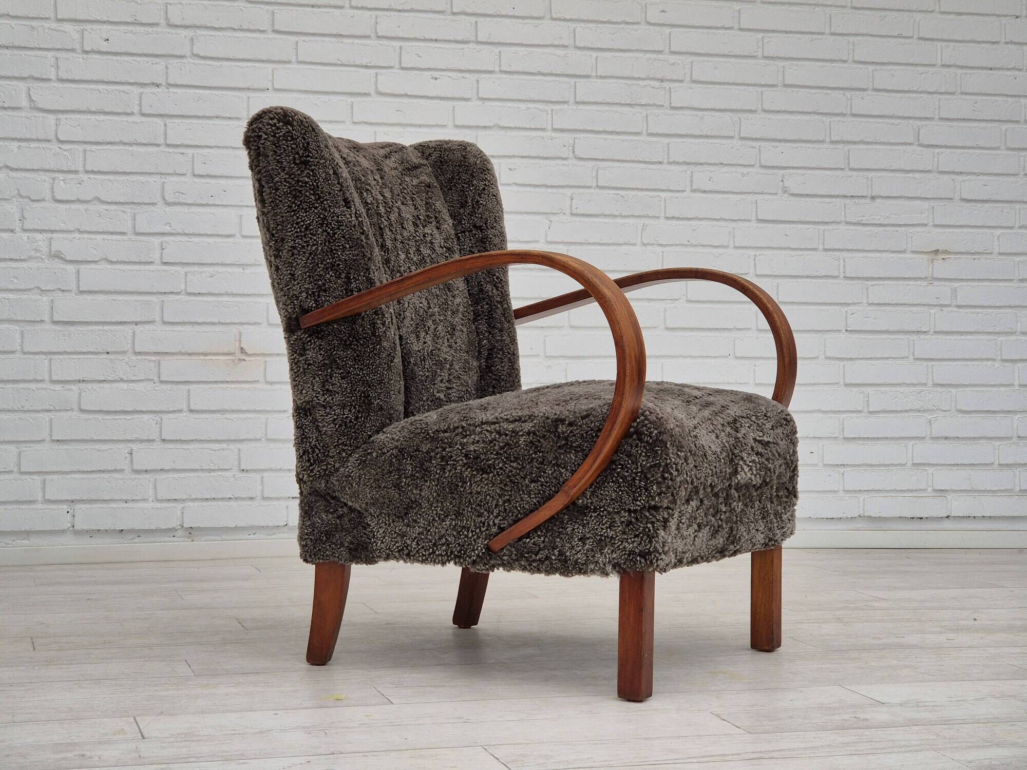 1950s, Danish design, reupholstered armchair, genuine sheepskin "Wellington".