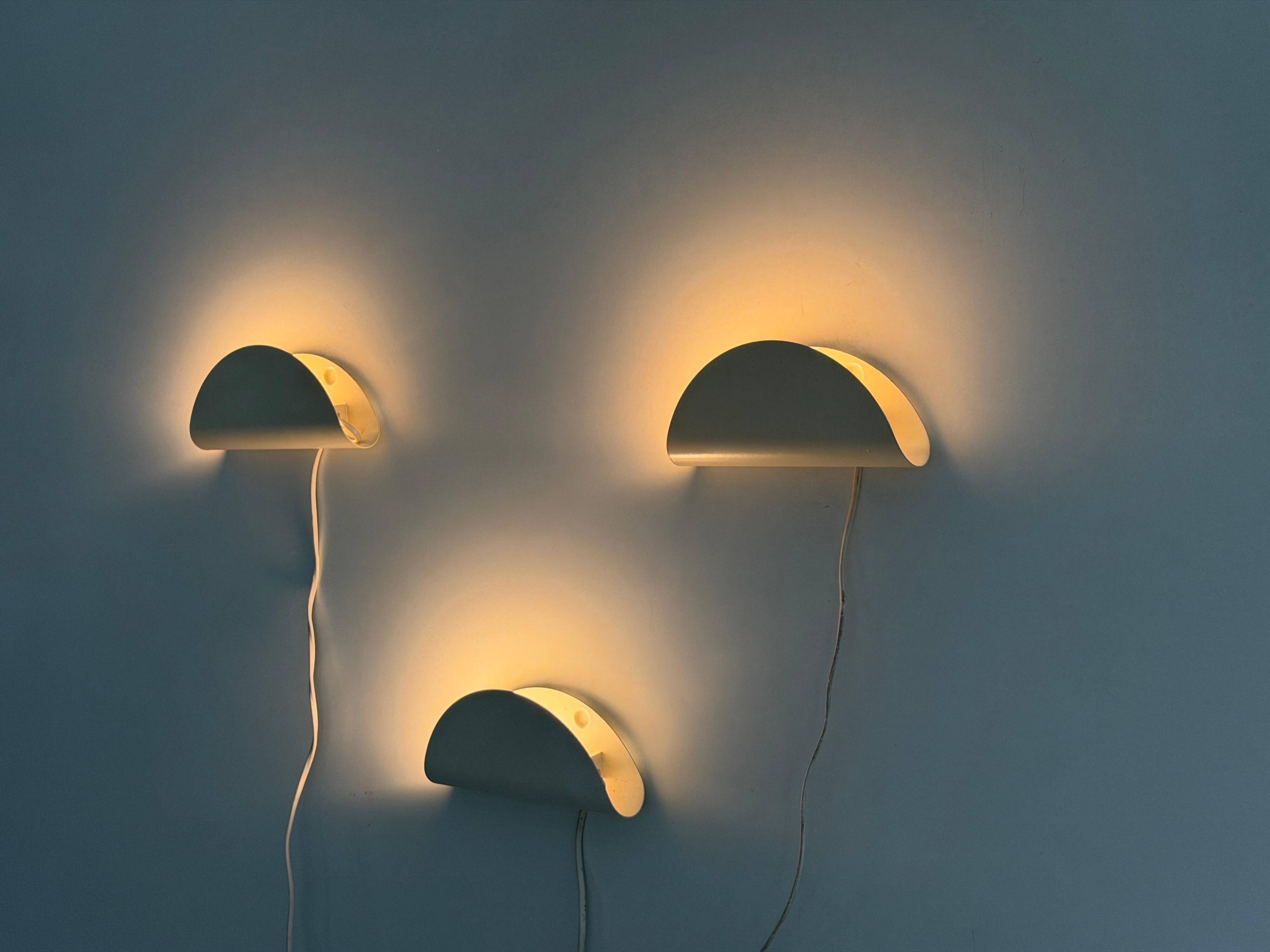 Set of three cream metal wall lights by Nordlux, 1980s, Sweden.