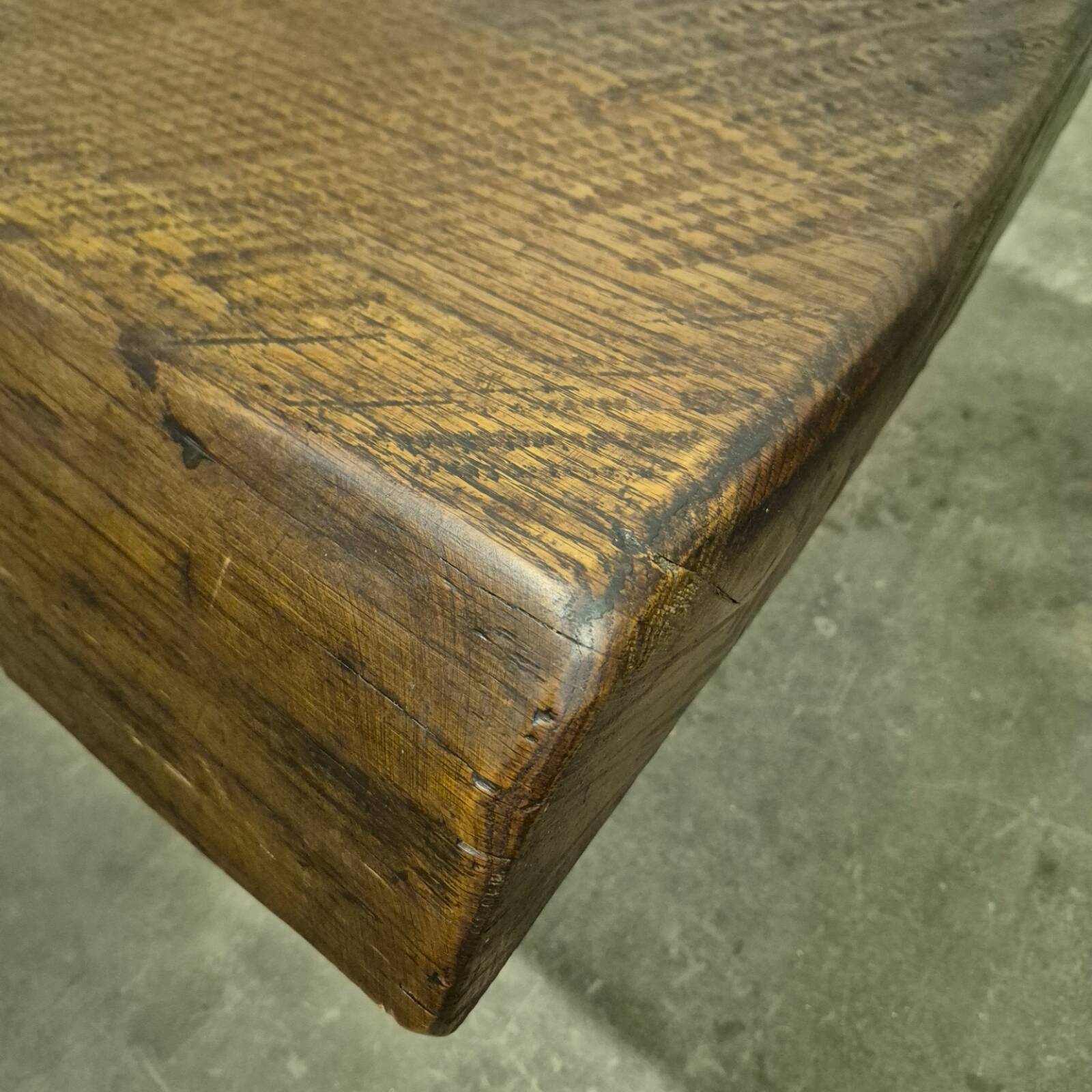 Rustic solid oak coffee table with a one piece top, France 1950s