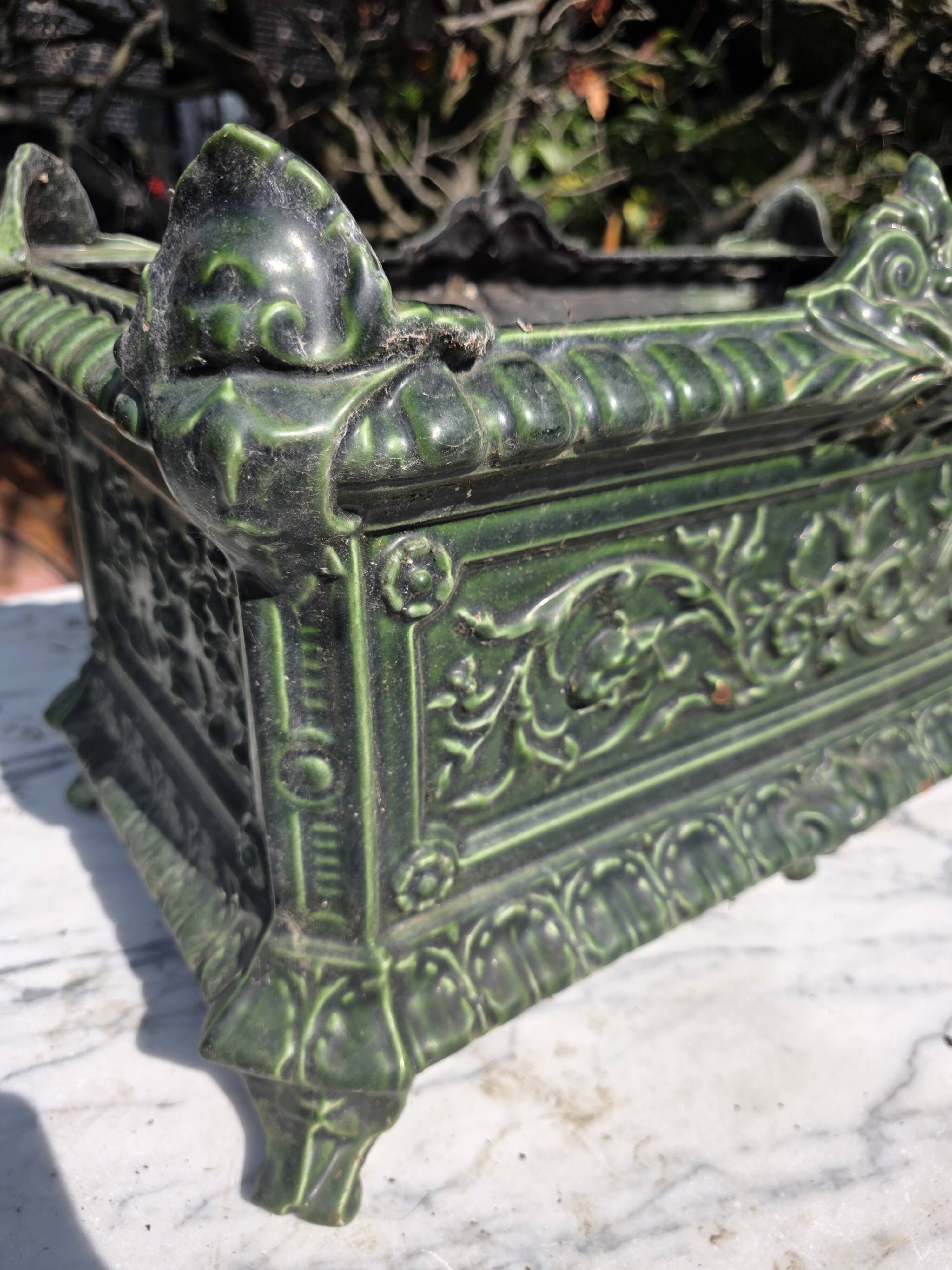 Antique enamelled cast iron planter in the Napoleon III style.