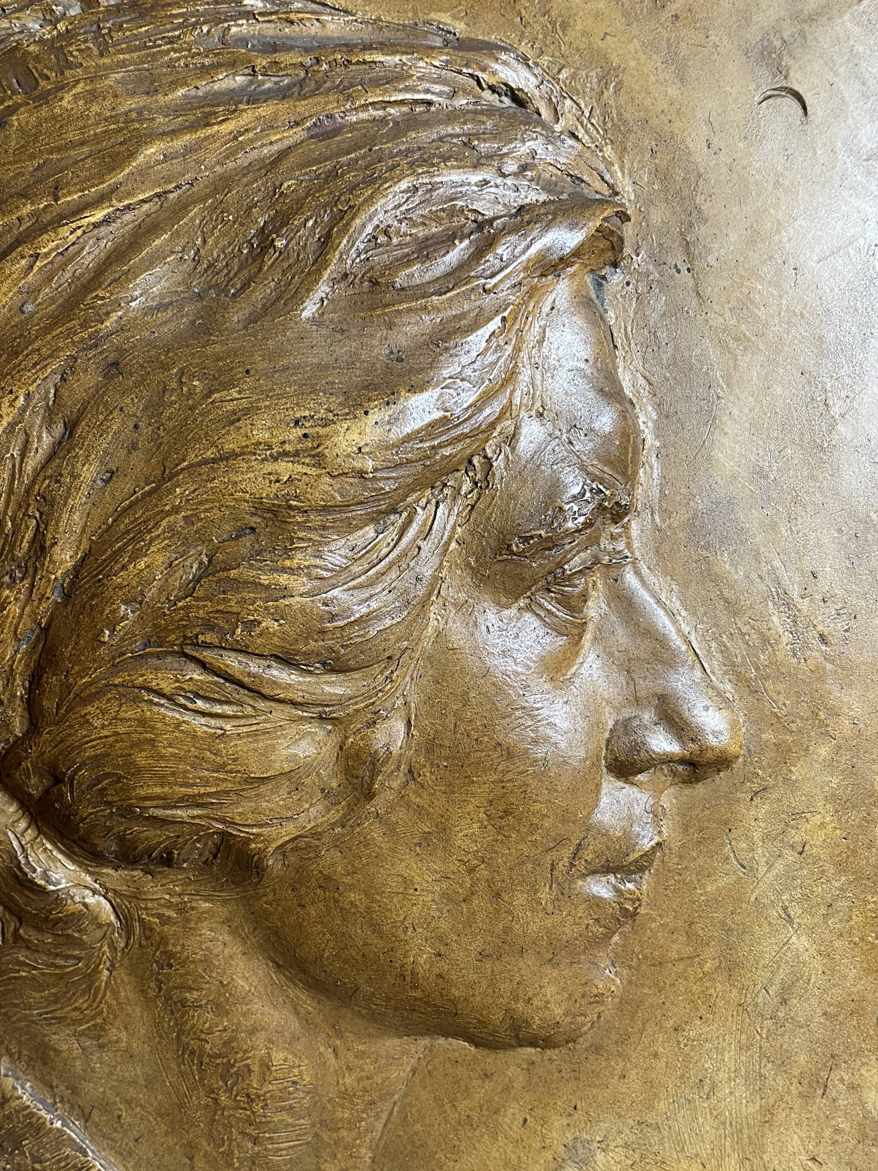 Patinated plaster bas-relief signed Robert Coutin, early 20th century.