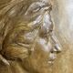 Patinated plaster bas-relief signed Robert Coutin, early 20th century.