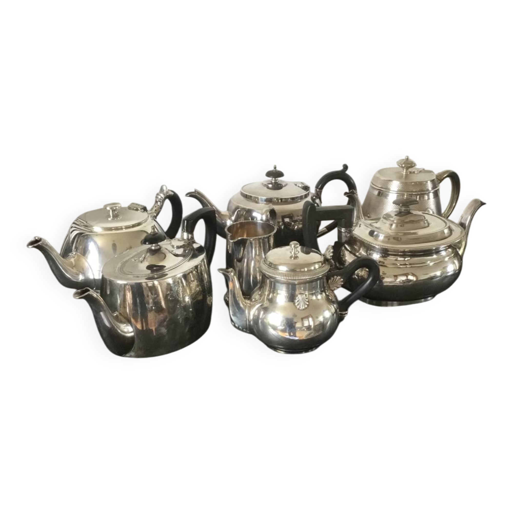 Set of teapots and milk jug.