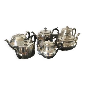 Set of teapots and milk jug.
