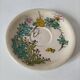 Japanese-style tea set in cracked earthenware with chrysanthemum flowers
