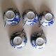 5 white and blue Japanese porcelain tea cups