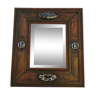 Old beveled mirror and monogrammed enamels