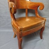Fauteuil de bureau garni de cuir début XIXe siècle,