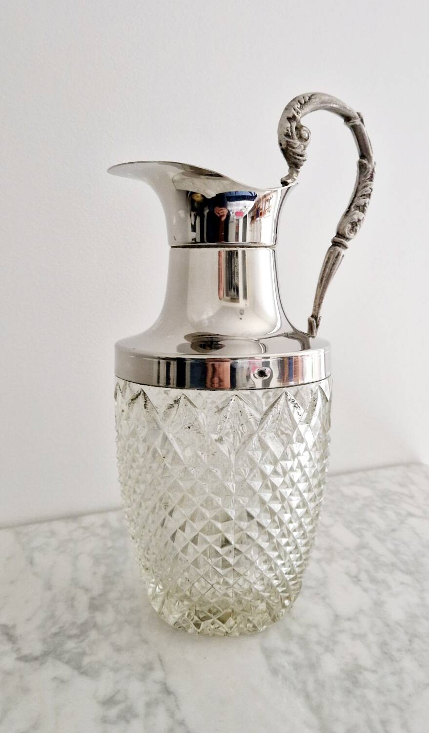 Glass and silver-plated carafe