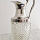 Glass and silver-plated carafe